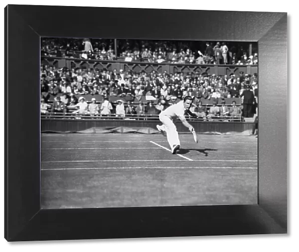 Fred Perry plays a back hand pass on The Centre Court at The Mens Wimbledon Tennis