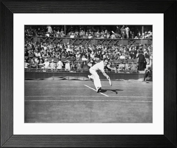 Framed Print : Fred Perry plays a back hand pass on The Centre Court at The Mens Wimbledon Tennis