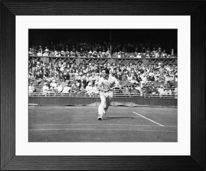Framed Print : Fred Perry plays a back hand pass on The Centre Court at The Mens Wimbledon Tennis