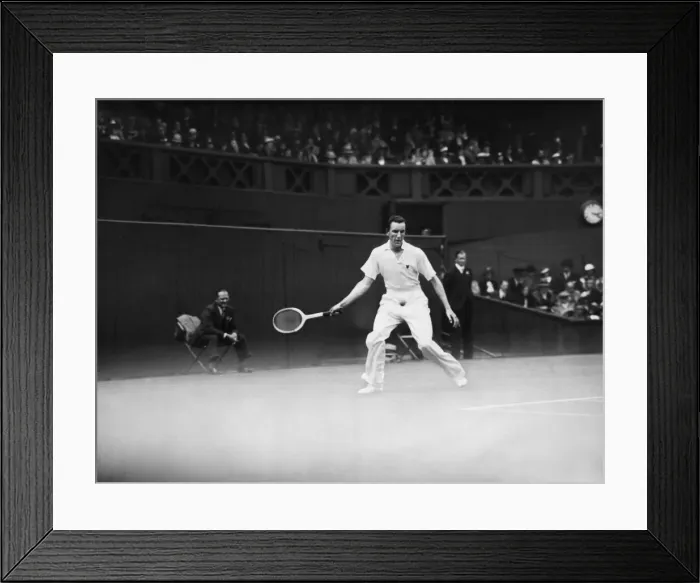 Framed Print : Fred Perry competing at The Mens singles Wimbledon Championships in 1934 on the centre Framed Print : Fred Perry competing at The Mens singles Wimbledon Championships in 1934 on the centre