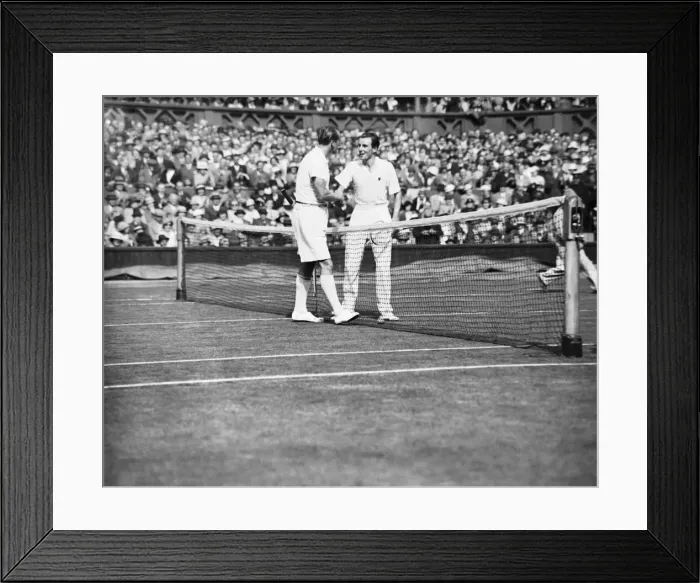 Framed Print : Fred Perry competing at The Mens singles Wimbledon Championships in 1934 on the centre Framed Print : Fred Perry competing at The Mens singles Wimbledon Championships in 1934 on the centre