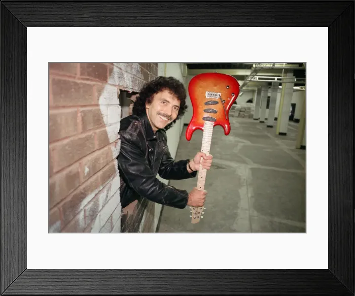 Framed Print : Black Sabbaths Tony Iommi helps to demolish a wall at Musical Exchanges in