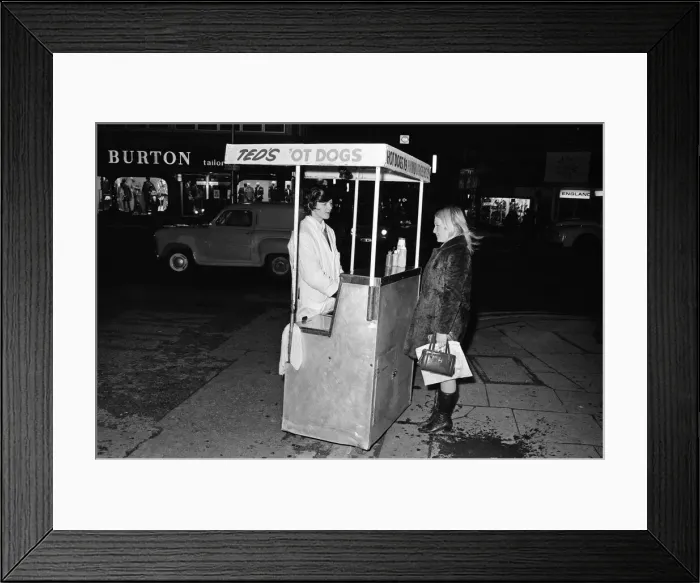 Framed Print : Street trader selling hot dogs. Birmingham, West Midlands. 20th November 1970 Framed Print : Street trader selling hot dogs. Birmingham, West Midlands. 20th November 1970