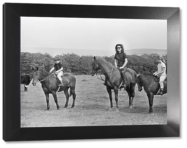 Jacqueline Kennedy out riding with her children John Kennedy Junior