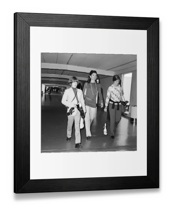 Framed Print : Jackie Onassis pictured at Heathrow Airport in London, pictured with her two children