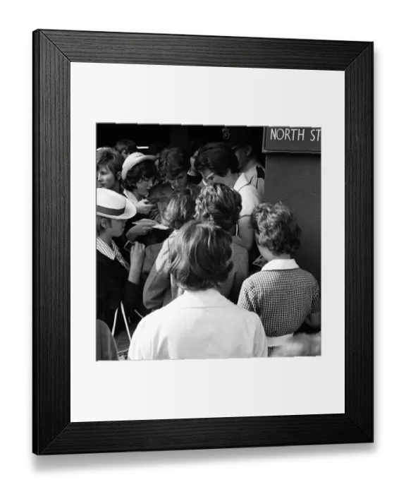 Framed Print : The 1962 Championships, Wimbledon. Billie Jean Moffitt (later King) signs autographs