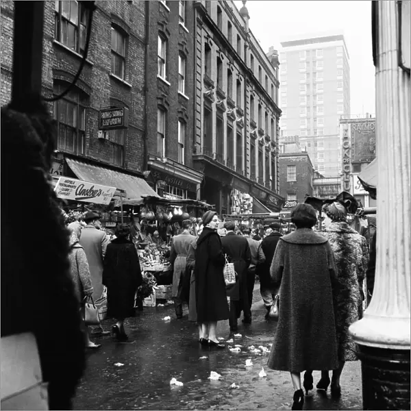 Shoppers shopping in Rupert Street market, Soho London. Circa 1950