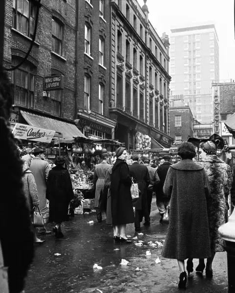 Shoppers shopping in Rupert Street market, Soho London. Circa 1950