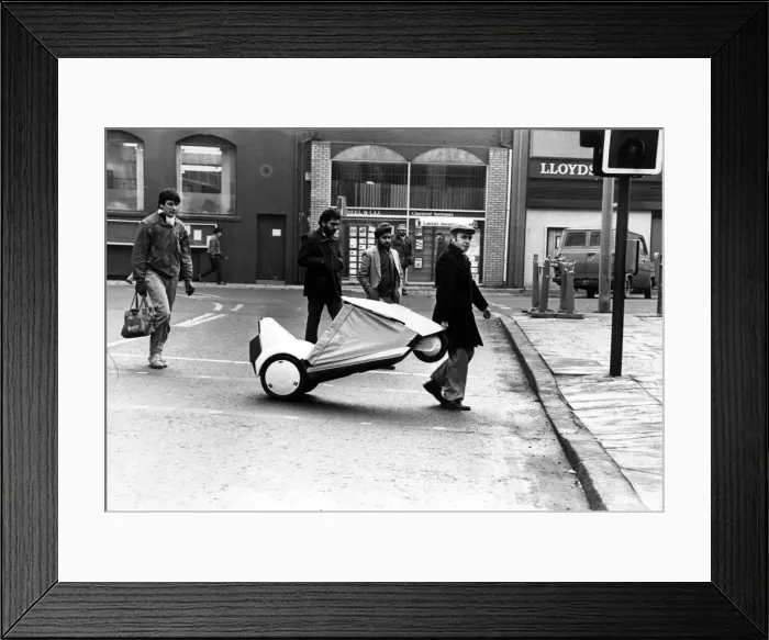Framed Print : David out and about on his Sinclair C5 in Cardiff. Crossing the road is no problem