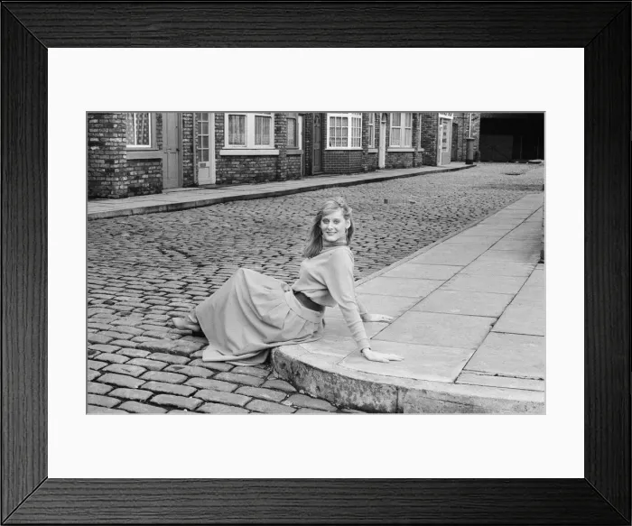 Framed Print : Actor Sarah Lancashire in a 1987 photo shoot on the cobbles of the set of Coronation Framed Print : Actor Sarah Lancashire in a 1987 photo shoot on the cobbles of the set of Coronation