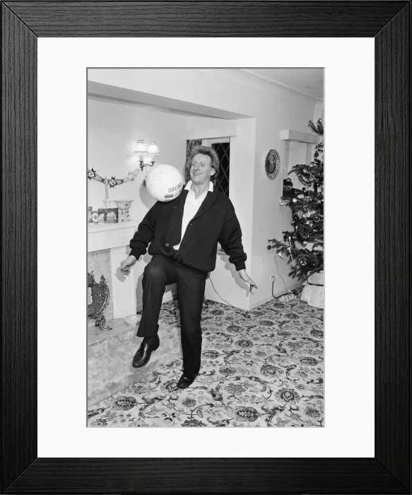 Framed Print : Denis Law, at home over Christmas in 1987. Denis Law CBE Framed Print : Denis Law, at home over Christmas in 1987. Denis Law CBE