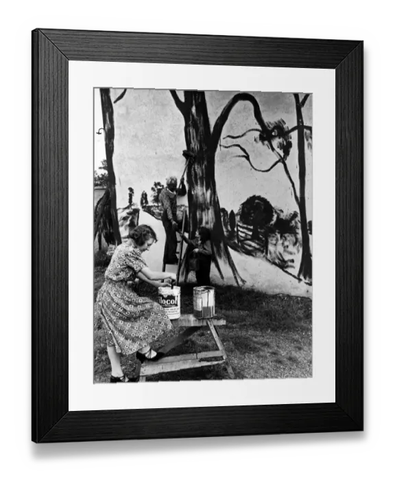 Framed Print : Camouflage at work at a cinema in Welwyn Garden City, Hertfordshire. 9th October 1939 Framed Print : Camouflage at work at a cinema in Welwyn Garden City, Hertfordshire. 9th October 1939