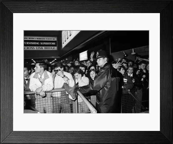 Framed Print : Thousands of young pop fans gather at the Bull Ring Shopping Centre for pop singer