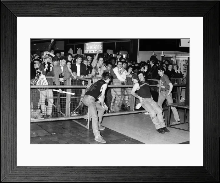 Framed Print : Thousands of young pop fans gather at the Bull Ring Shopping Centre for pop singer