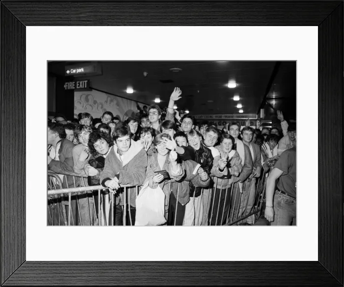 Framed Print : Thousands of young pop fans gather at the Bull Ring Shopping Centre for pop singer