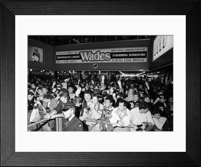 Framed Print : Thousands of young pop fans gather at the Bull Ring Shopping Centre for pop singer