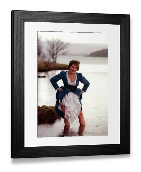 Framed Print : Lorraine Kelly GMTV presenter February 1998 dressed in the tartan dress wading in Framed Print : Lorraine Kelly GMTV presenter February 1998 dressed in the tartan dress wading in