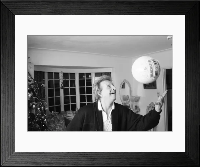 Framed Print : Denis Law, at home over Christmas in 1987. Denis Law CBE Framed Print : Denis Law, at home over Christmas in 1987. Denis Law CBE