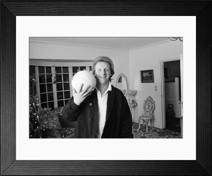 Framed Print : Denis Law, at home over Christmas in 1987. Denis Law CBE Framed Print : Denis Law, at home over Christmas in 1987. Denis Law CBE