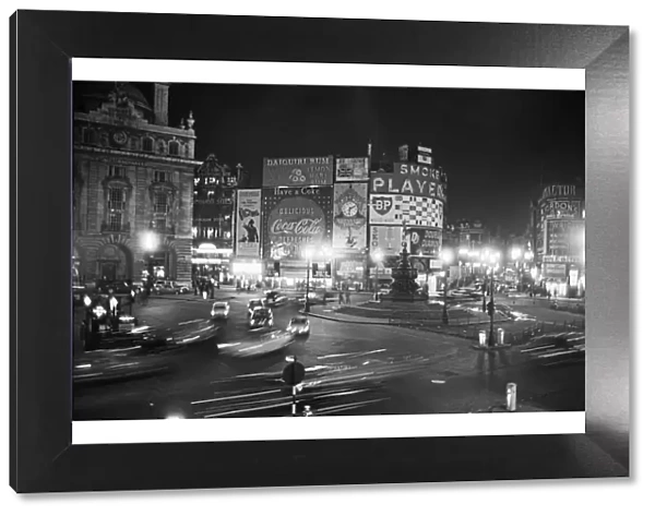 Piccadilly Circus at night. London. Picture shows the scene where the Advertising