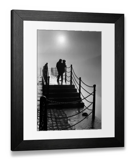 Framed Print : A couple enjoy the magic mood created by the fog at Liverpools Albert Dock Framed Print : A couple enjoy the magic mood created by the fog at Liverpools Albert Dock