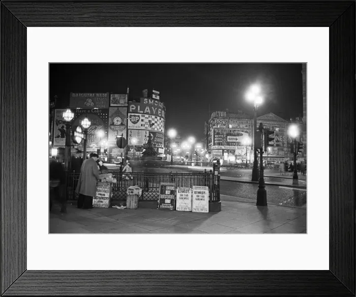 Framed Print : Piccadilly Circus at night. London. Picture shows the scene where the Advertising