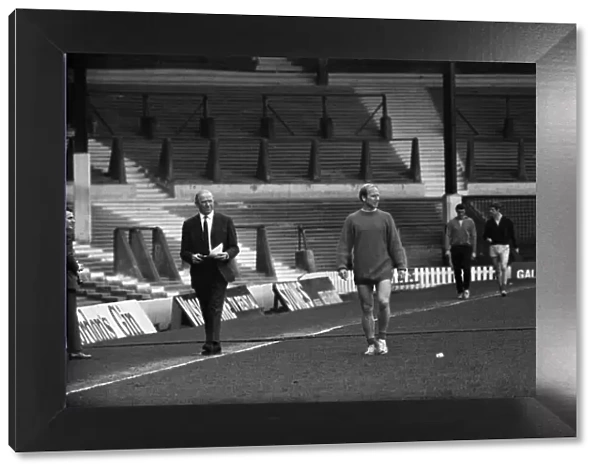 Manchester United training at Old Trafford. Matt Busby and Bobby Charlton