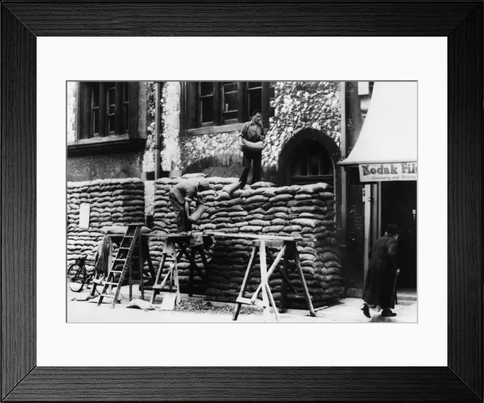 Framed Print : Men sand bagging Market Street Police station, Torquay. Circa August 1939
