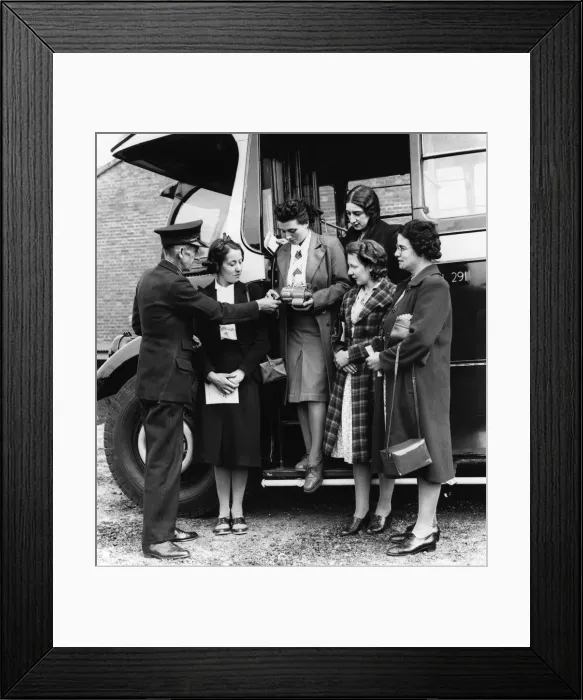 Framed Print : Bus girls being trained on the buses. 19th November 1940 Framed Print : Bus girls being trained on the buses. 19th November 1940