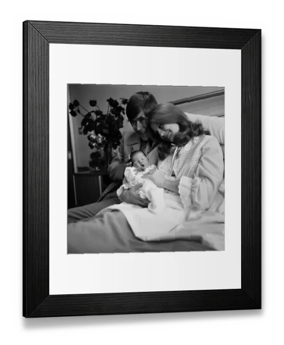 Framed Print : Comedian Mike Yarwood visits his wife Sandra and their new baby daughter Charlotte in