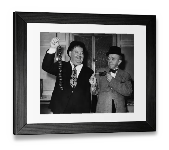 Framed Print : Laurel and Hardy were a comedy duo act during the early Classical Hollywood era of