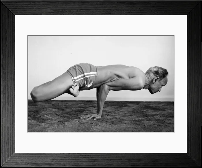 Framed Print : Yoga positions. Position is called Lotus in Peacock (Padma Mayurasana