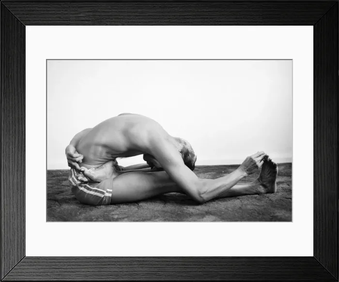 Framed Print : Yoga positions. Position is called Half Lotus forward Fold Framed Print : Yoga positions. Position is called Half Lotus forward Fold