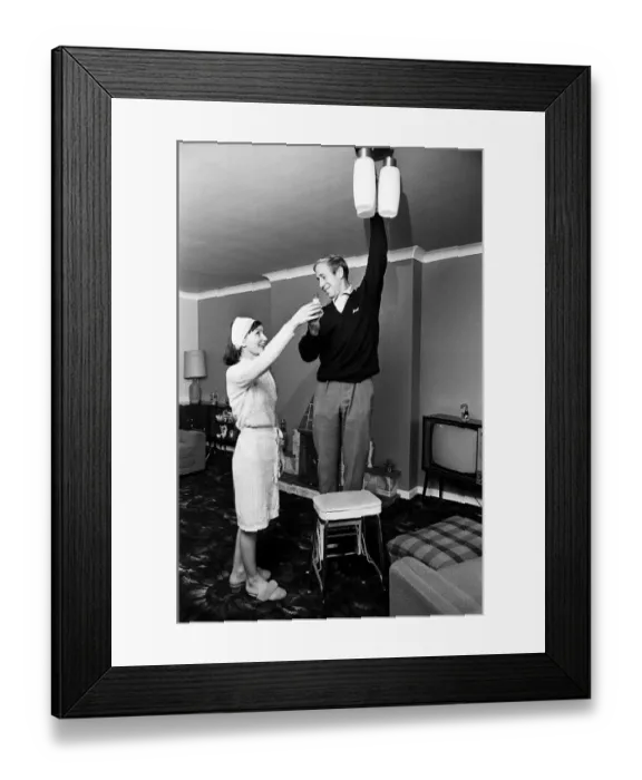Framed Print : Manchester Uniteds Bobby Charlton pictured with his wife Norma at their new luxury