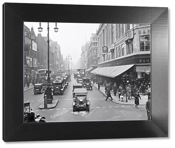 Oxford Street, London. A busy scene with cars and pedestrians