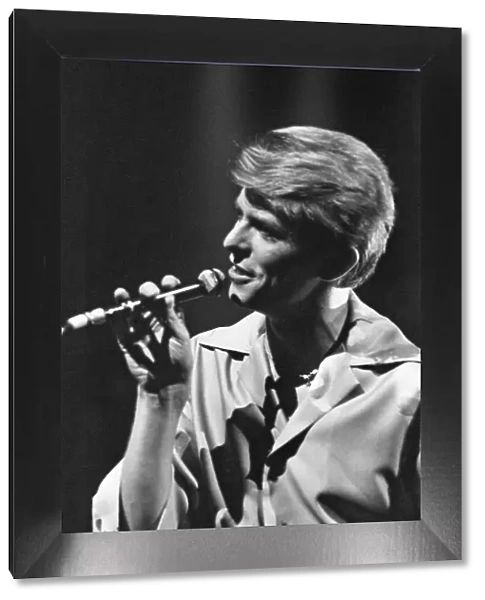 British pop singer David Bowie performing on stage during his concert at Earls court