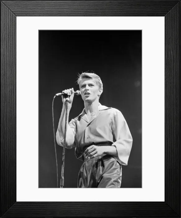 Framed Print : British pop singer David Bowie performing on stage during his concert at Earls court