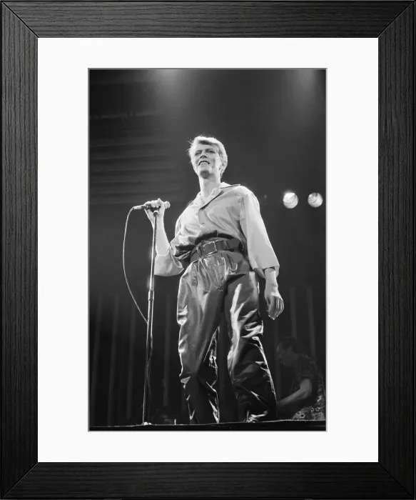 Framed Print : British pop singer David Bowie performing on stage during his concert at Earls court