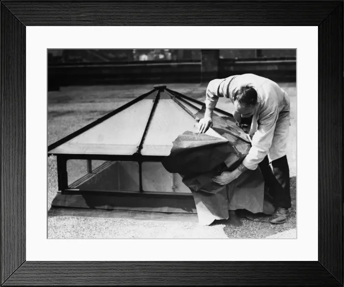 Framed Print : Blackout preparations hiding skylights on rooftop with paper. 13th July 1939 Framed Print : Blackout preparations hiding skylights on rooftop with paper. 13th July 1939