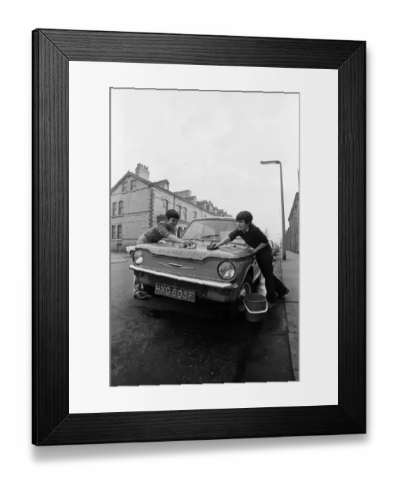 Framed Print : Youth club boys clean cars. 1971