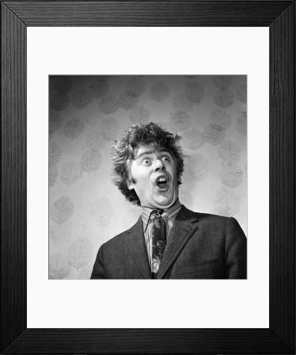 Framed Print : TV star impressionist Mike Yarwood. He is pictured impersonating Ken Dodd Framed Print : TV star impressionist Mike Yarwood. He is pictured impersonating Ken Dodd