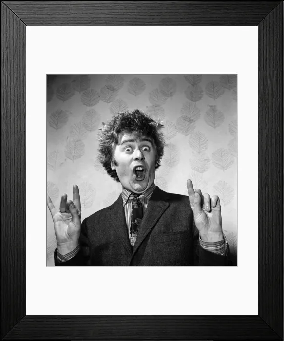 Framed Print : TV star impressionist Mike Yarwood. He is pictured impersonating Ken Dodd Framed Print : TV star impressionist Mike Yarwood. He is pictured impersonating Ken Dodd