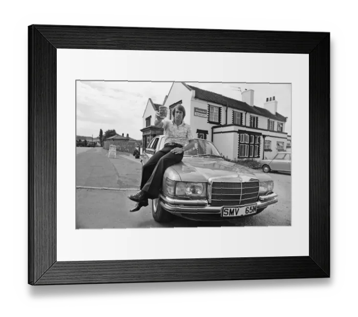 Framed Print : Geoff Hurst, Stoke City and ex-England footballer, pictured working in the pub that he