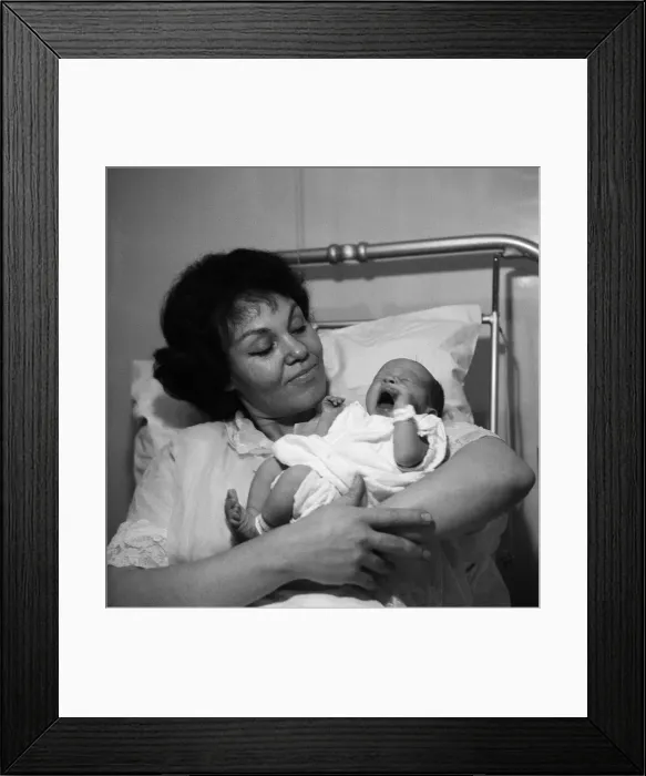 Framed Print : Jazz singer Cleo Laine pictured with her new baby daughter Jaqueline. 6th February 1963