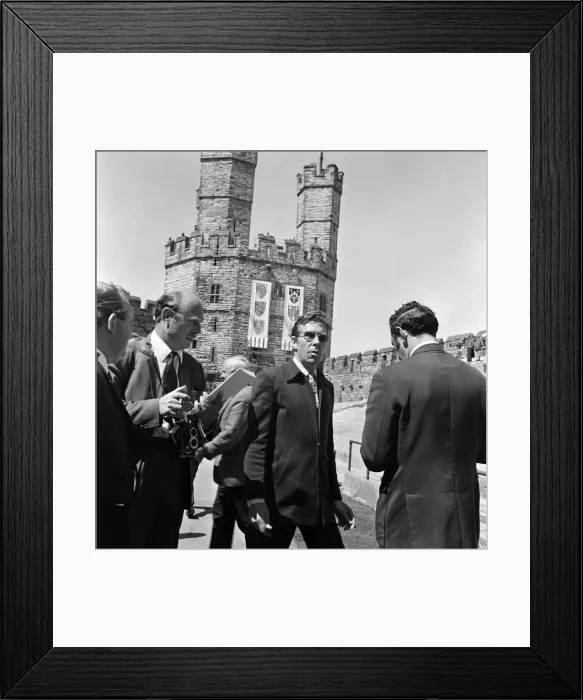 Framed Print : Lord Snowdon discusses arrangements for the ceremony ahead of the investiture of Framed Print : Lord Snowdon discusses arrangements for the ceremony ahead of the investiture of