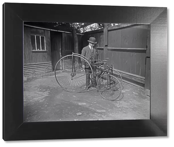 Coventry cycle collector Mr T M Freeman seen here admiring his new purchase a Singer