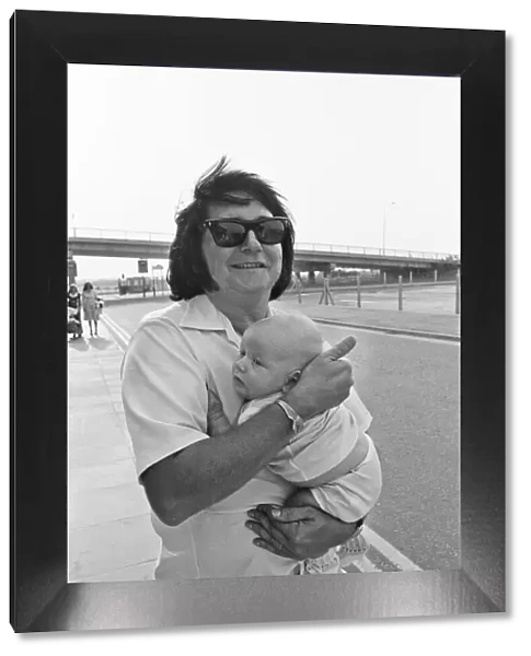 Singer Roy Orbison, pictured at Manchester Ringway Airport in 1975