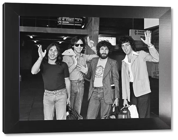 10CC, music group, pictured at Manchester Airport. Picture shows members