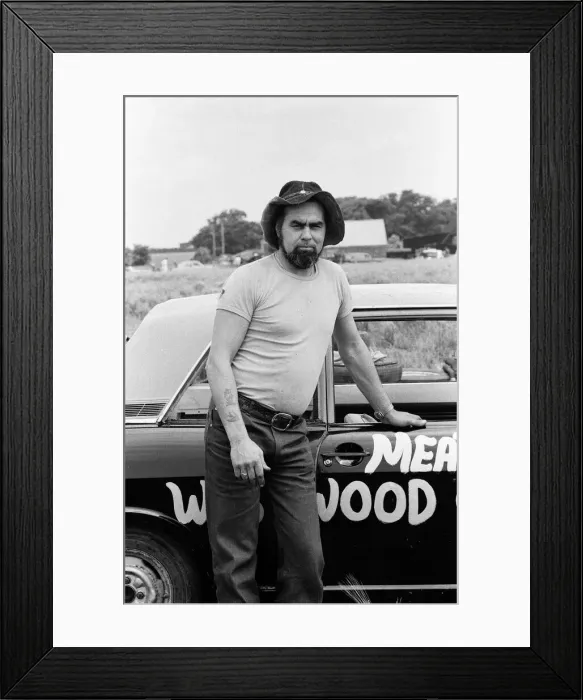 Framed Print : Stunt driver Mick Stirrups comes down to earth with a crash after tying to leap over
