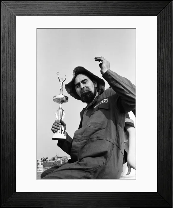 Framed Print : Stunt driver Mick Stirrups drove his Zephyr car off a ramp Framed Print : Stunt driver Mick Stirrups drove his Zephyr car off a ramp